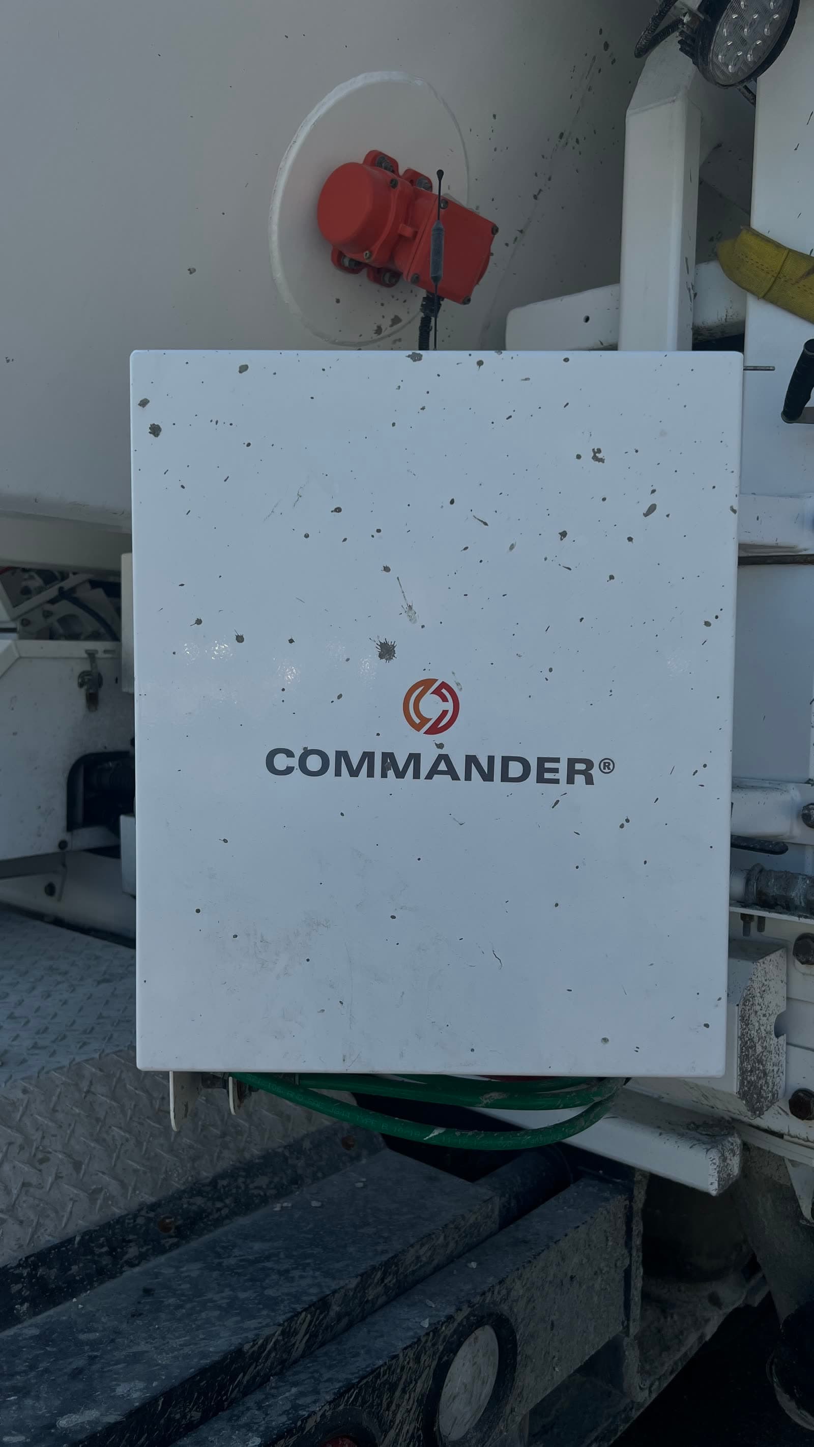 Close-up of the COMMANDER batching control unit mounted on a Quality-Crete volumetric mixer