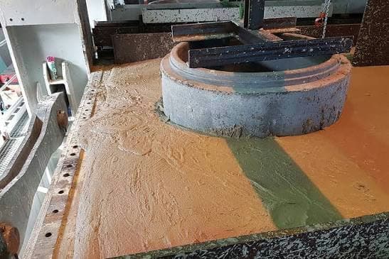 Manhole surround backfilled with flowable fill