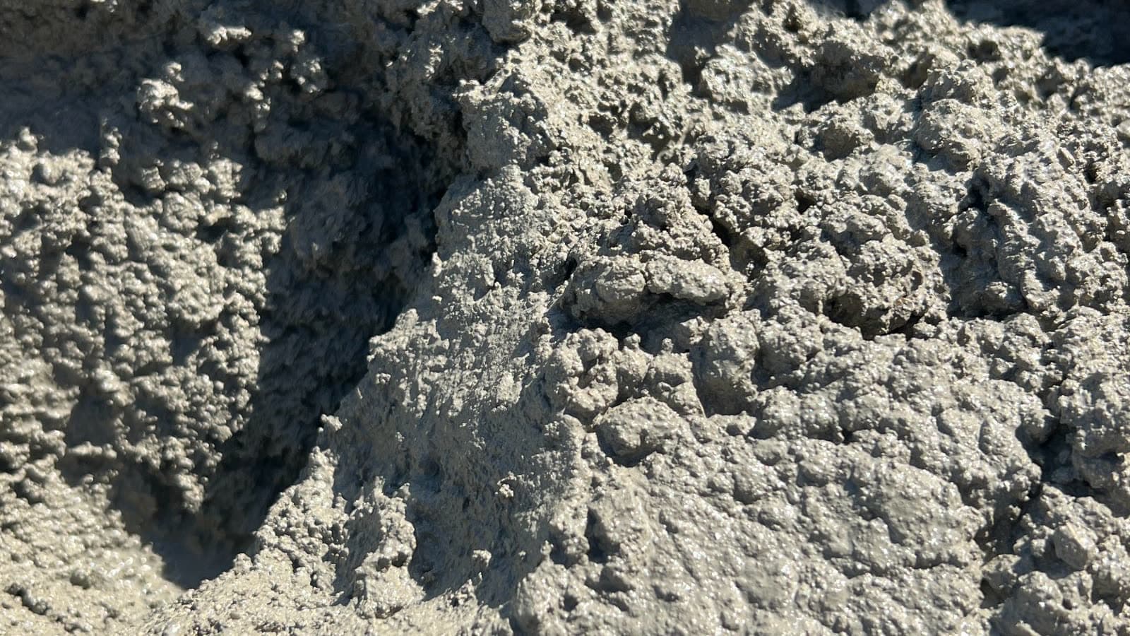 Freshly mixed concrete aggregate on a jobsite