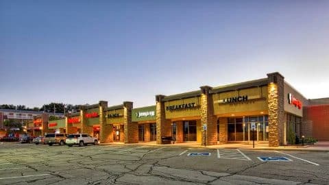 Retail strip center at dusk